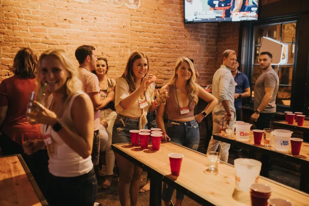 Girls Playing beer pong